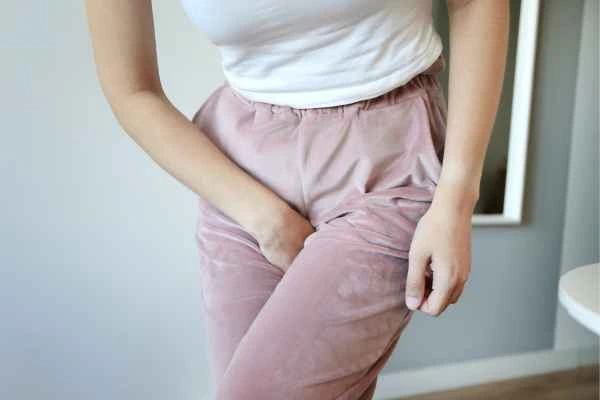 older woman running to the toilet because of urinary incontinence Melksham